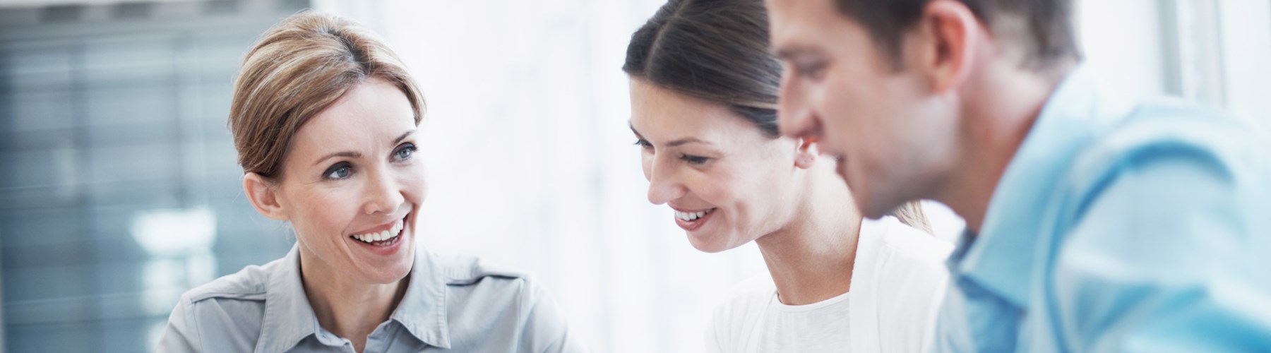 three people in meeting